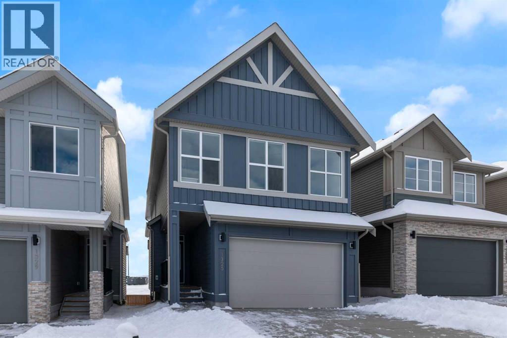 1325 South Point Parade Sw, Airdrie, Alberta  T4B 0Y7 - Photo 2 - A2272948