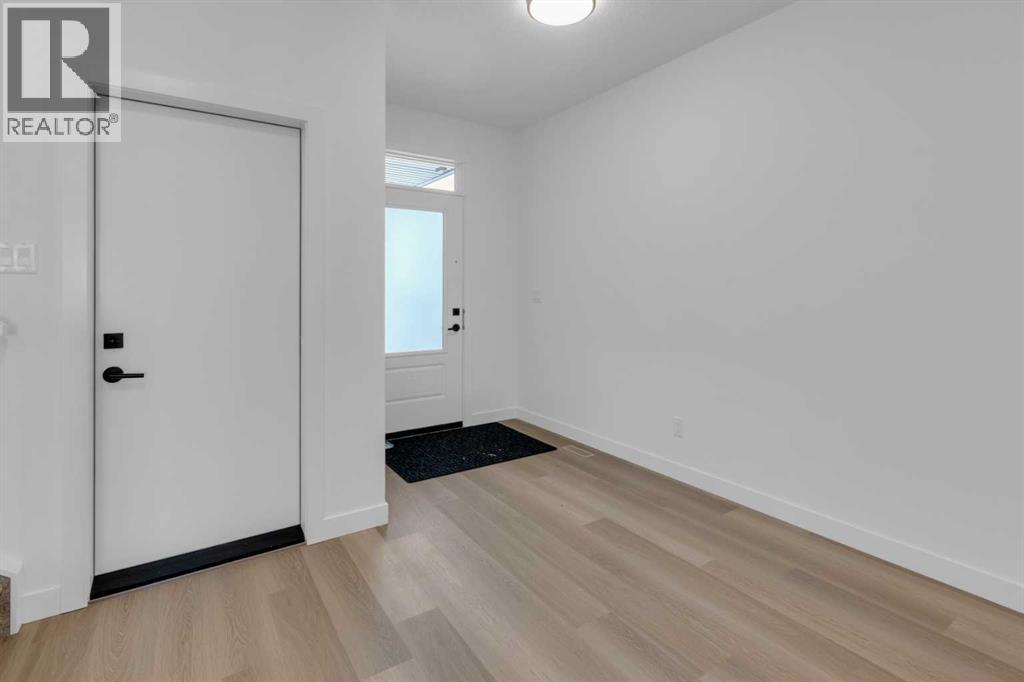 1325 South Point Parade Sw, Airdrie, Alberta  T4B 0Y7 - Photo 5 - A2272948