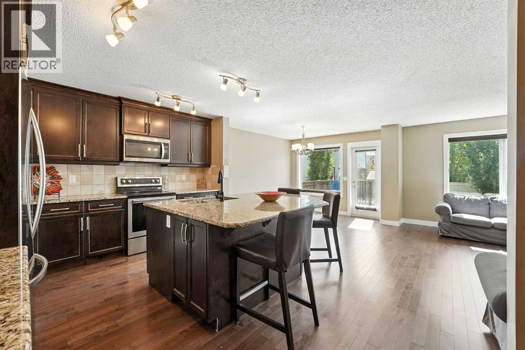 124 Kingsbridge Way Se, Airdrie, Alberta  T4A 0M6 - Photo 4 - A2251393