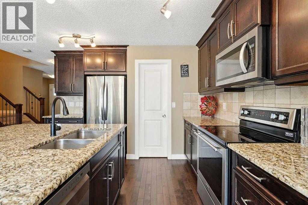 124 Kingsbridge Way Se, Airdrie, Alberta  T4A 0M6 - Photo 6 - A2251393
