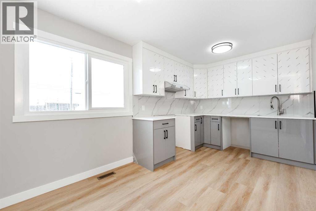 7616 27 Street Se, Calgary, Alberta  T2C 1E7 - Photo 5 - A2273189