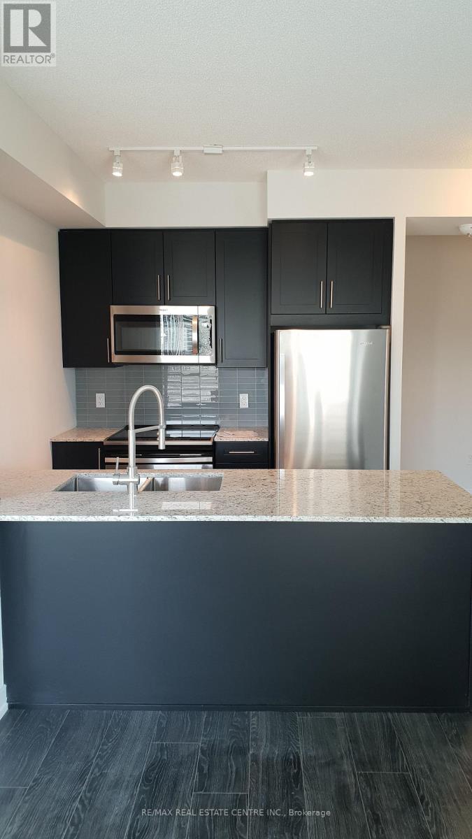 1215 - 4055 Parkside Village Drive, Mississauga, Ontario  L5B 0K8 - Photo 3 - W12587086