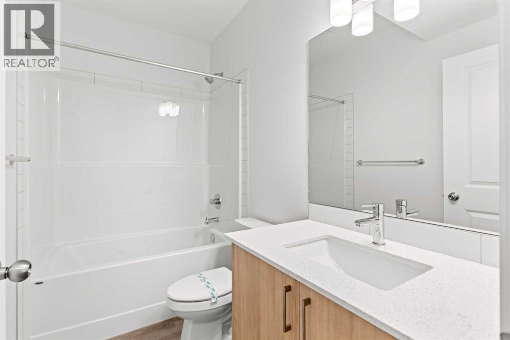 918 Creekside Boulevard Sw, Calgary, Alberta  T2X 5G8 - Photo 20 - A2268874