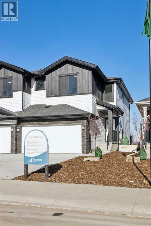 213 Southbow Drive, Cochrane, Alberta  T4C 3J3 - Photo 1 - A2273092