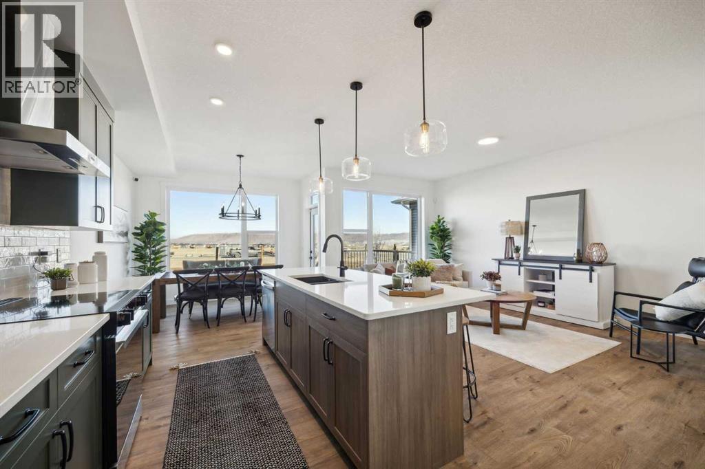 213 Southbow Drive, Cochrane, Alberta  T4C 3J3 - Photo 6 - A2273092