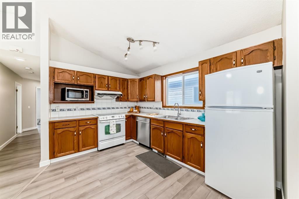 34 Erin Meadows Close Se, Calgary, Alberta  T2B 3E4 - Photo 6 - A2273056