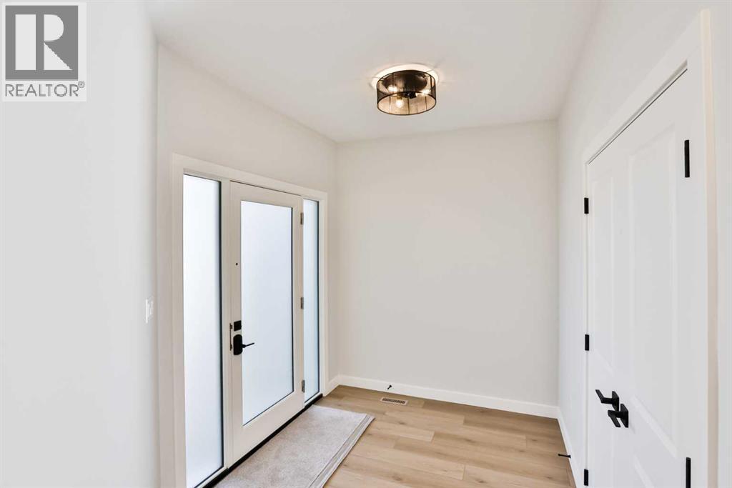 542 Malahat Green W, Lethbridge, Alberta  T1J 5W4 - Photo 3 - A2272361