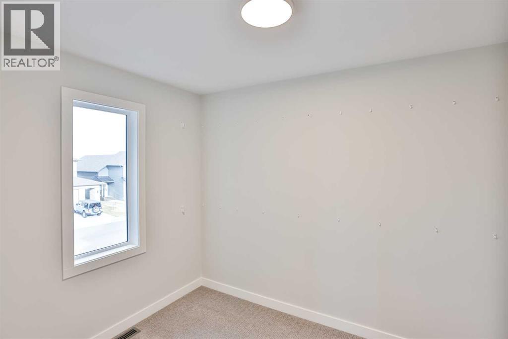 542 Malahat Green W, Lethbridge, Alberta  T1J 5W4 - Photo 20 - A2272361