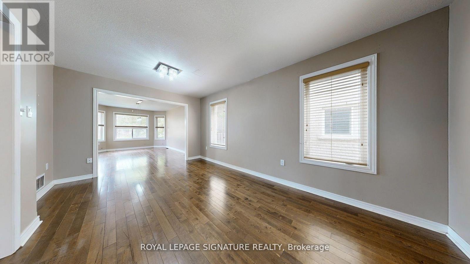 61 Buchanan Drive, New Tecumseth, Ontario  L6R 0A1 - Photo 6 - N12587430