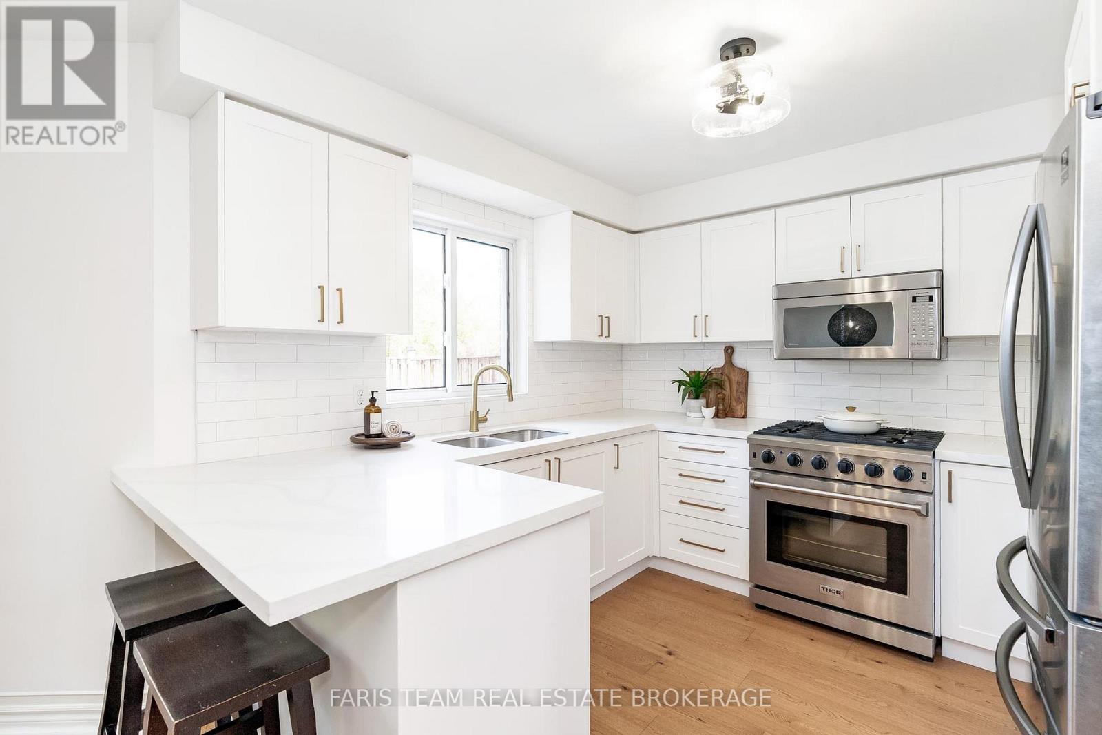 102 Country Lane, Barrie, Ontario  L4N 0N3 - Photo 4 - S12587476