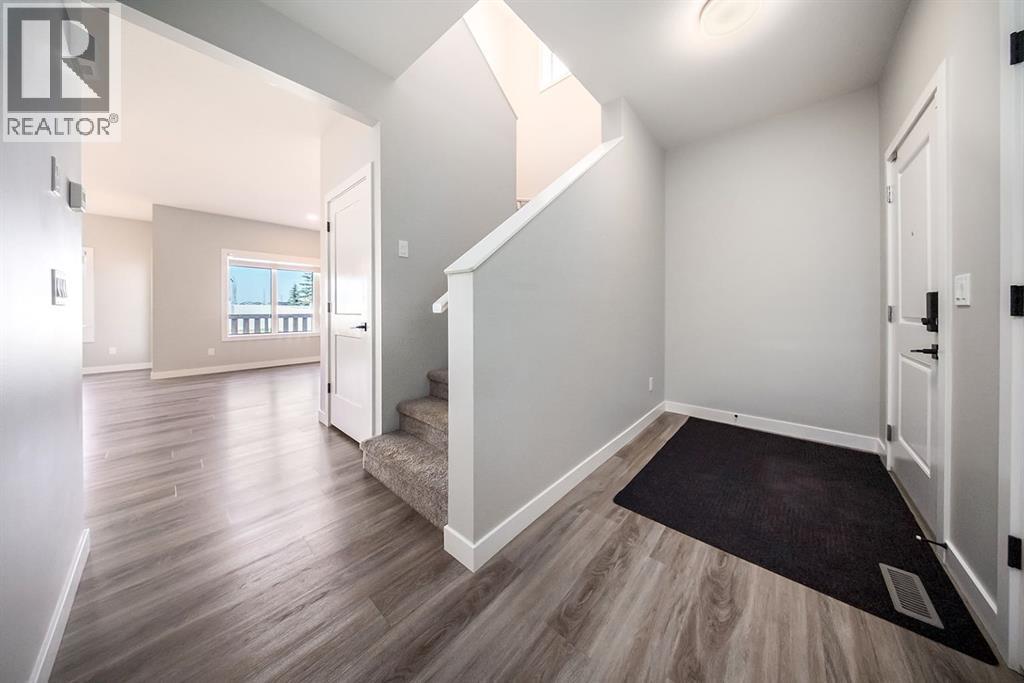 88 Henderson Crescent, Penhold, Alberta  T0M 1R0 - Photo 2 - A2265156