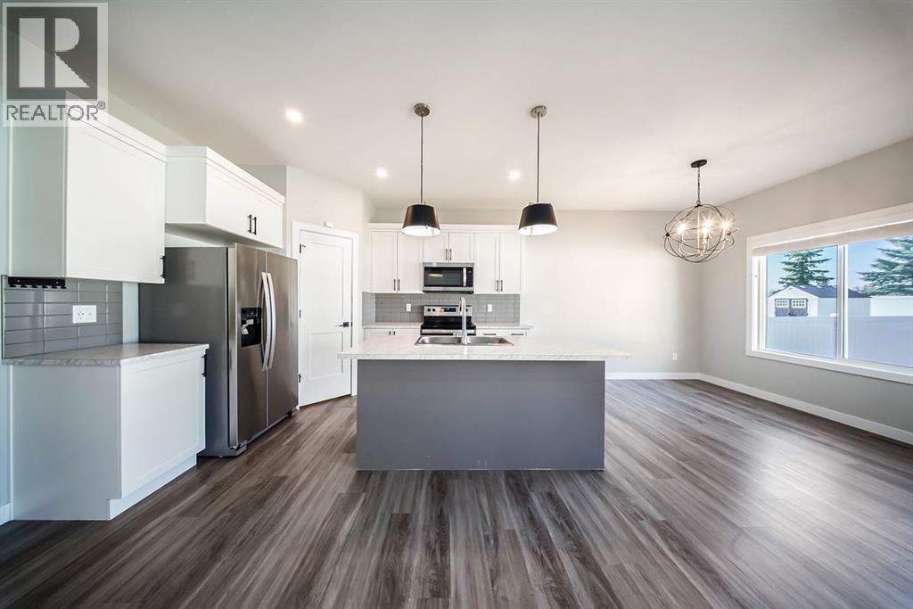 88 Henderson Crescent, Penhold, Alberta  T0M 1R0 - Photo 4 - A2265156