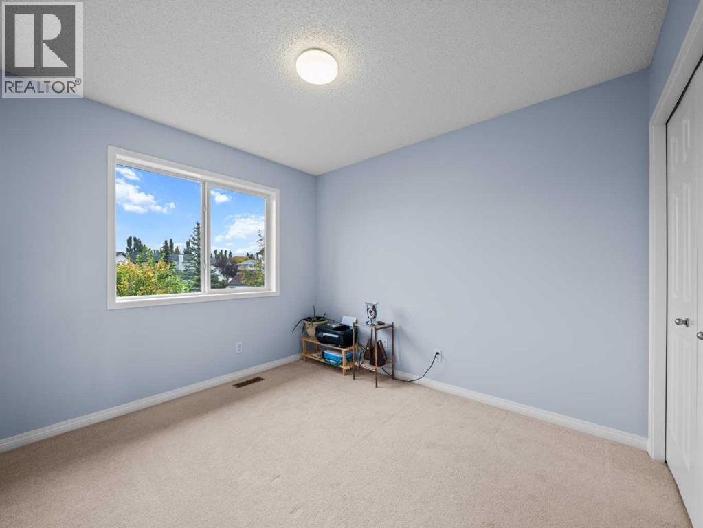 104 Rocky Ridge Heath Nw, Calgary, Alberta  T3G 4Z8 - Photo 17 - A2261861