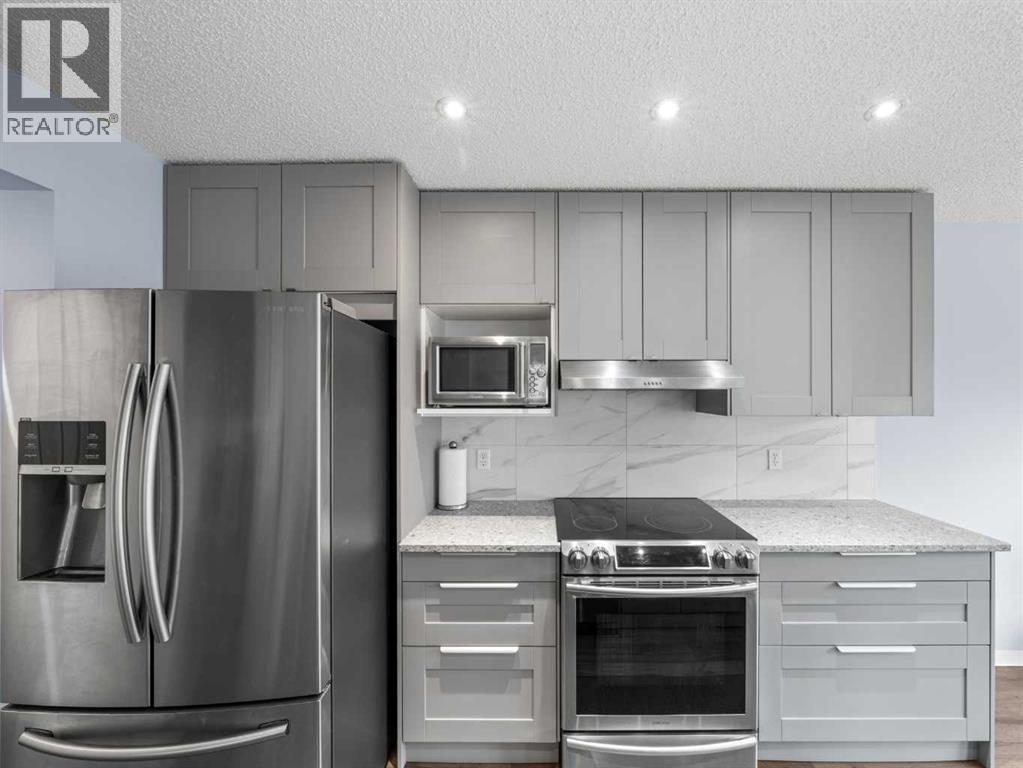 104 Rocky Ridge Heath Nw, Calgary, Alberta  T3G 4Z8 - Photo 8 - A2261861