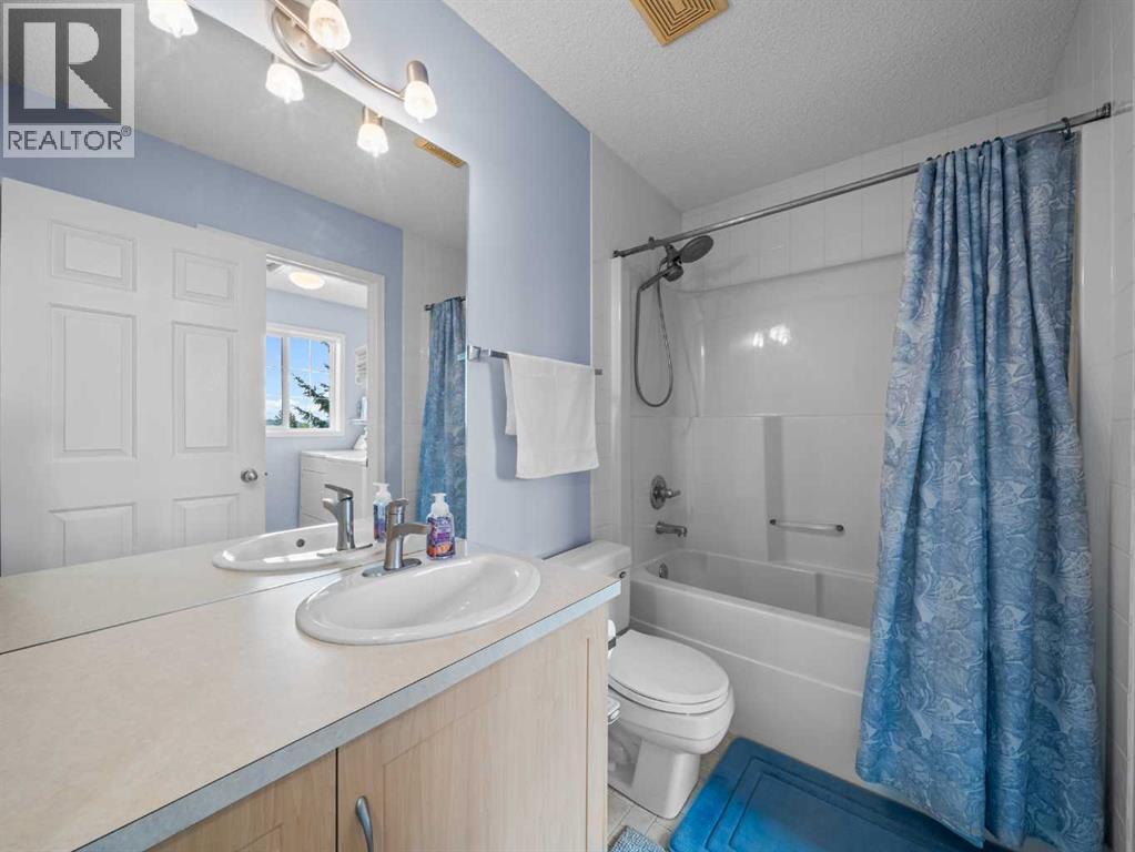 104 Rocky Ridge Heath Nw, Calgary, Alberta  T3G 4Z8 - Photo 19 - A2261861