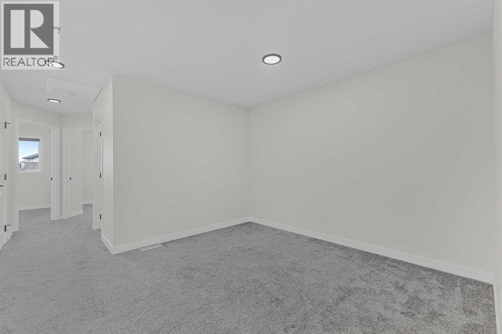 33 Belmont Drive Sw, Calgary, Alberta  T2X 4Z6 - Photo 13 - A2264027