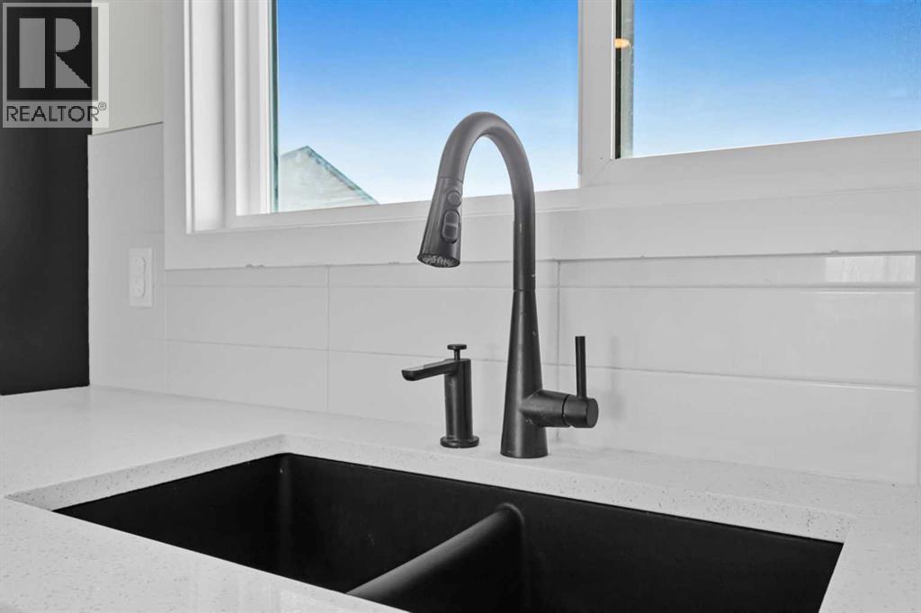 33 Belmont Drive Sw, Calgary, Alberta  T2X 4Z6 - Photo 9 - A2264027