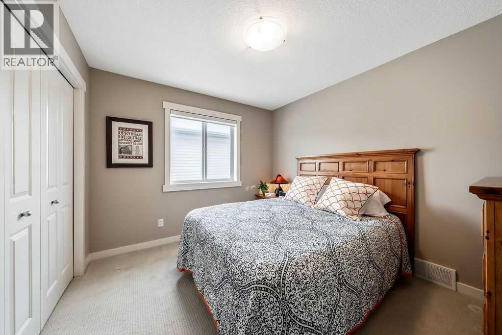 78 Ypres Green Sw, Calgary, Alberta  T2T 6M1 - Photo 21 - A2272935
