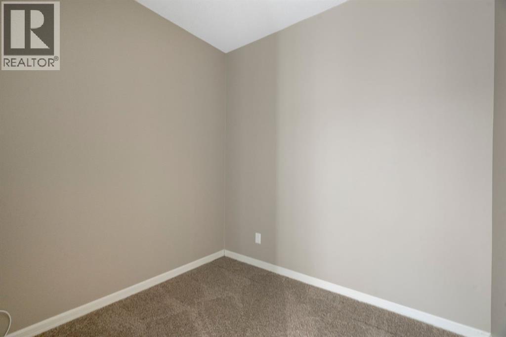 4214, 92 Crystal Shores Road, Okotoks, Alberta T1S 2N2 - Photo 8 - A2263113