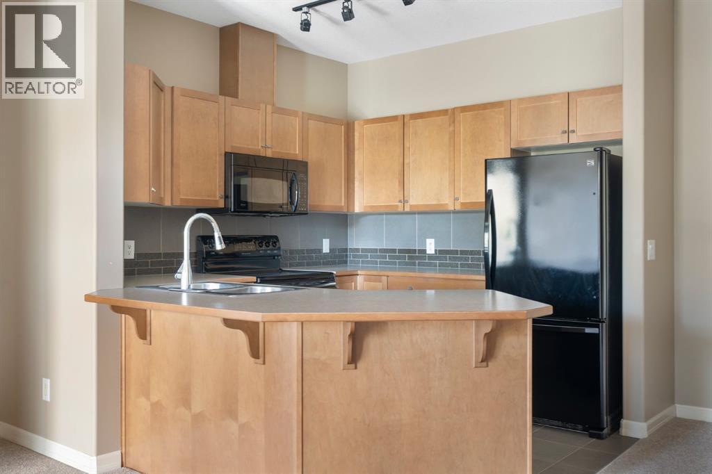 4214, 92 Crystal Shores Road, Okotoks, Alberta T1S 2N2 - Photo 14 - A2263113