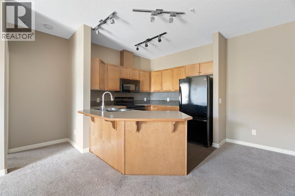 4214, 92 Crystal Shores Road, Okotoks, Alberta T1S 2N2 - Photo 13 - A2263113