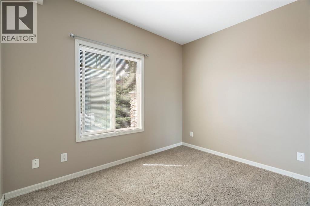 4214, 92 Crystal Shores Road, Okotoks, Alberta T1S 2N2 - Photo 19 - A2263113