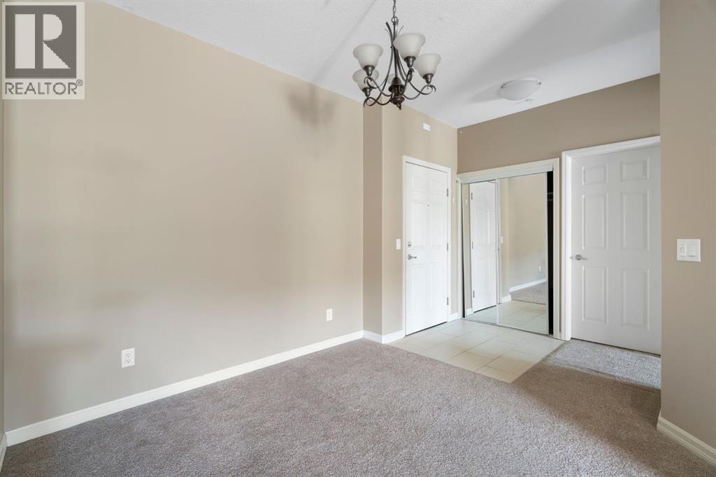 4214, 92 Crystal Shores Road, Okotoks, Alberta T1S 2N2 - Photo 4 - A2263113