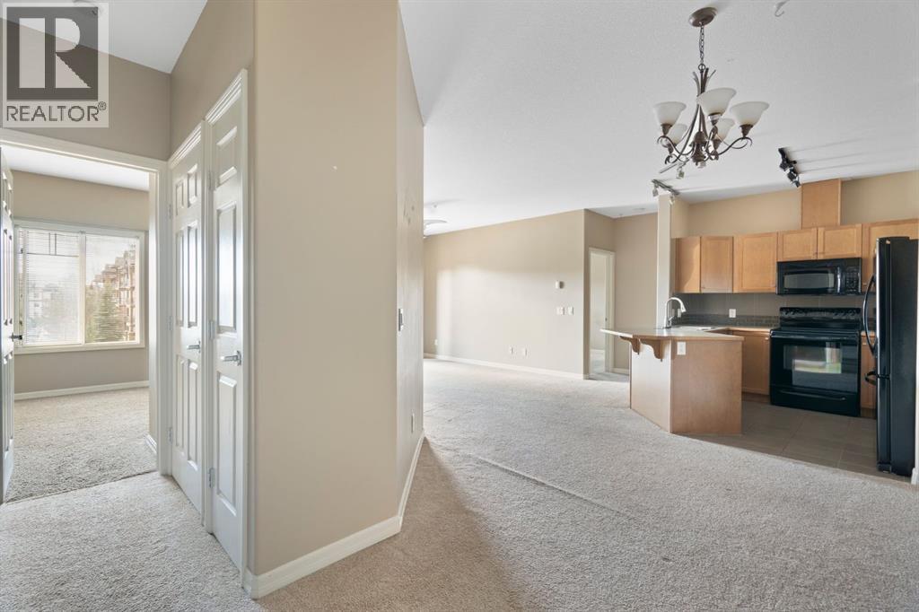 4214, 92 Crystal Shores Road, Okotoks, Alberta T1S 2N2 - Photo 6 - A2263113