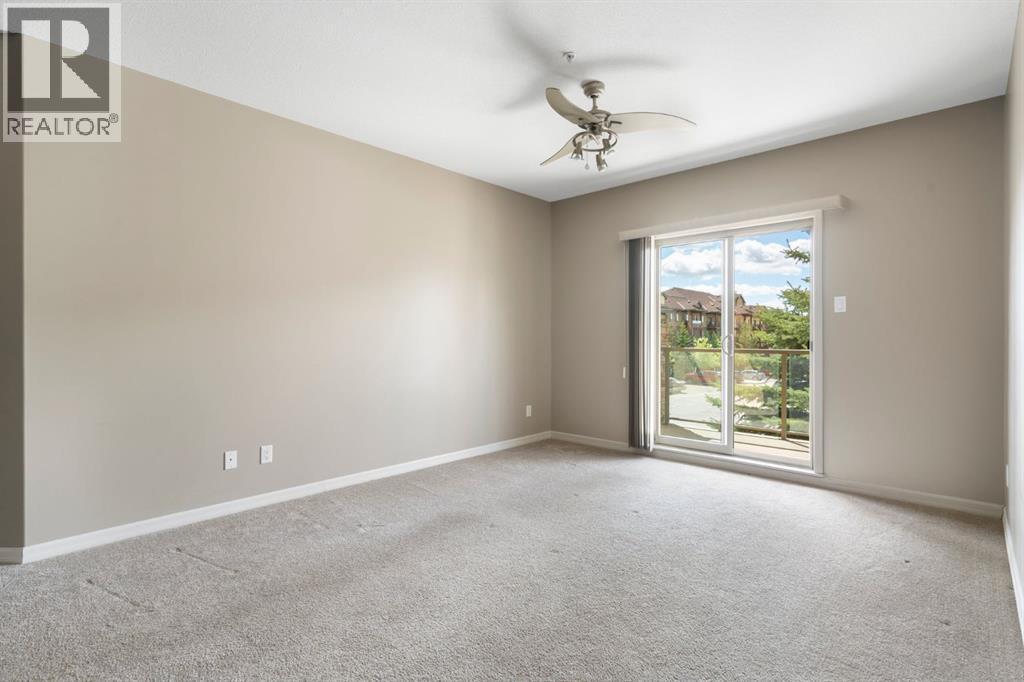 4214, 92 Crystal Shores Road, Okotoks, Alberta T1S 2N2 - Photo 17 - A2263113