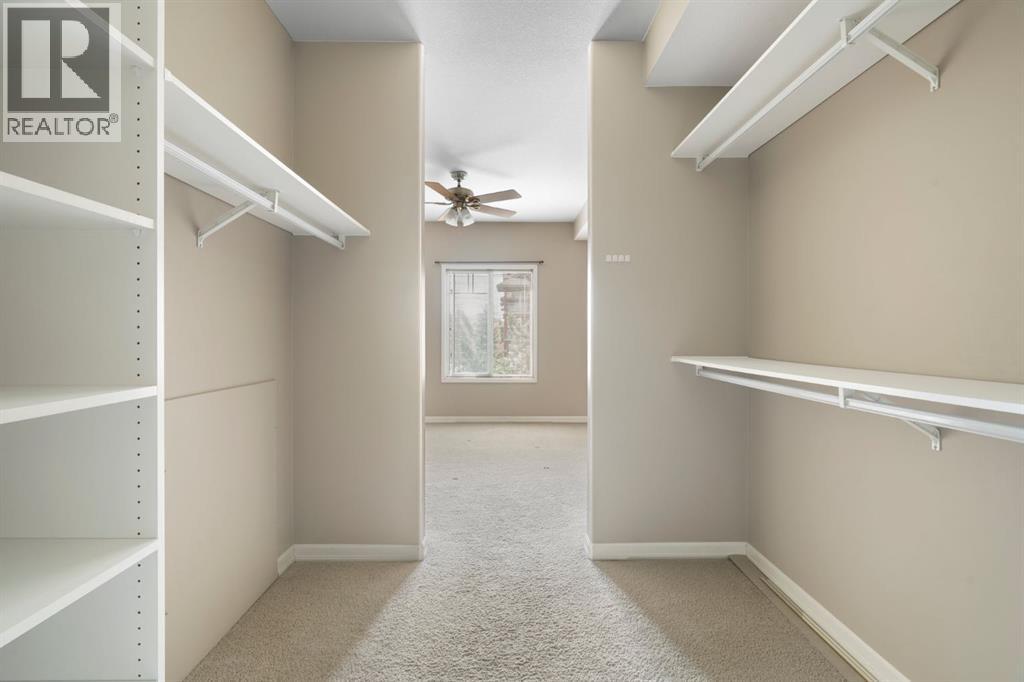 4214, 92 Crystal Shores Road, Okotoks, Alberta T1S 2N2 - Photo 23 - A2263113