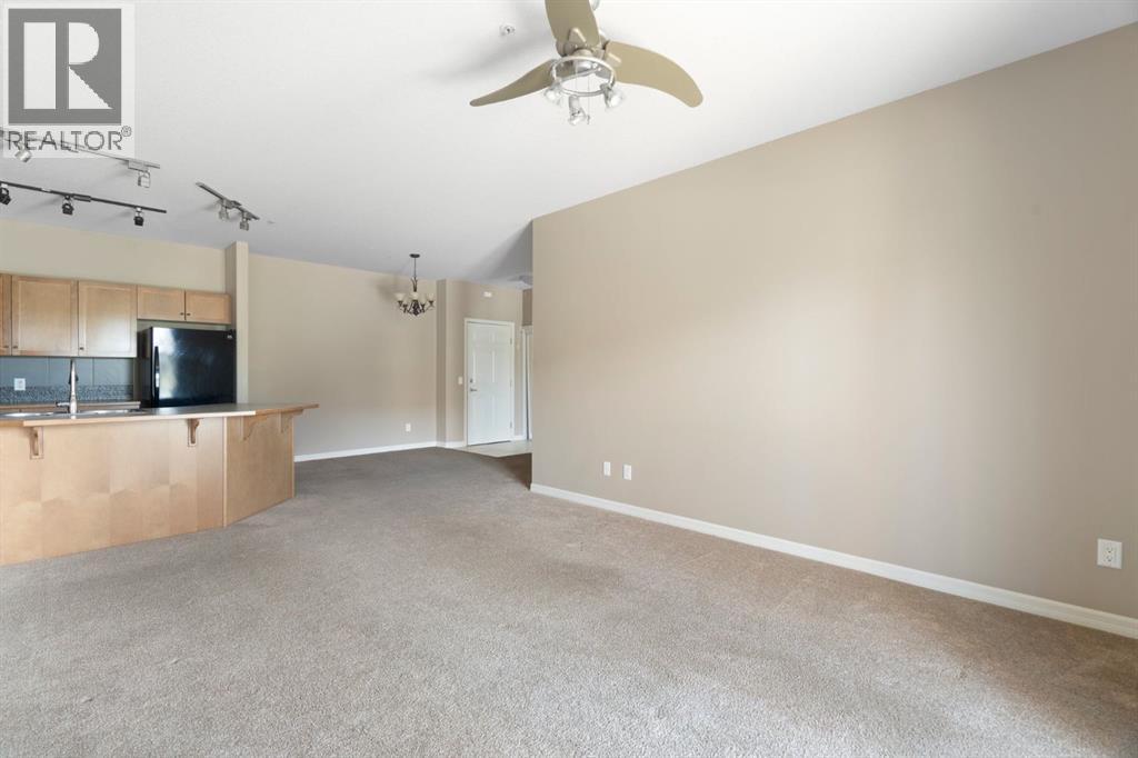 4214, 92 Crystal Shores Road, Okotoks, Alberta T1S 2N2 - Photo 21 - A2263113