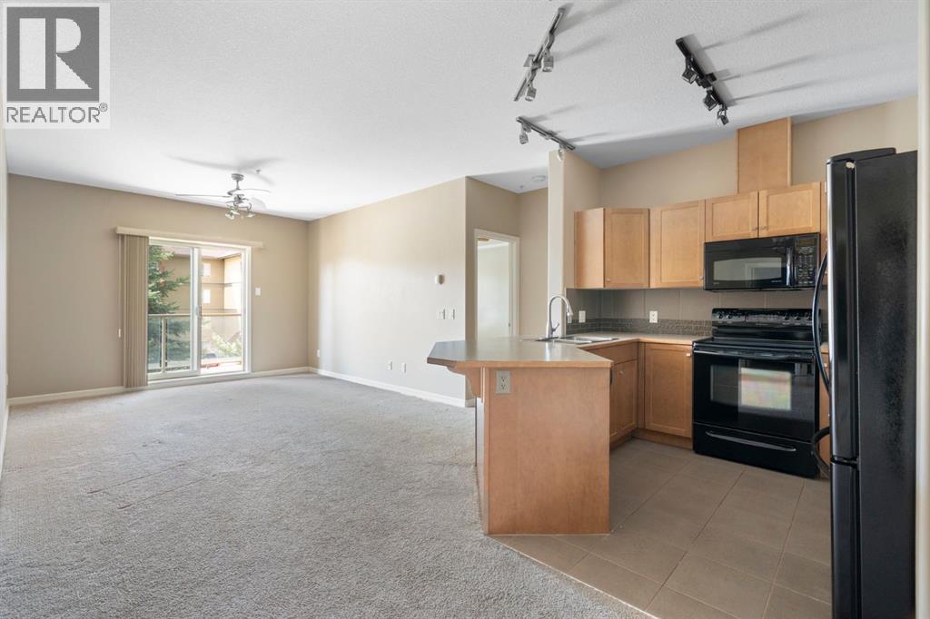 4214, 92 Crystal Shores Road, Okotoks, Alberta T1S 2N2 - Photo 11 - A2263113