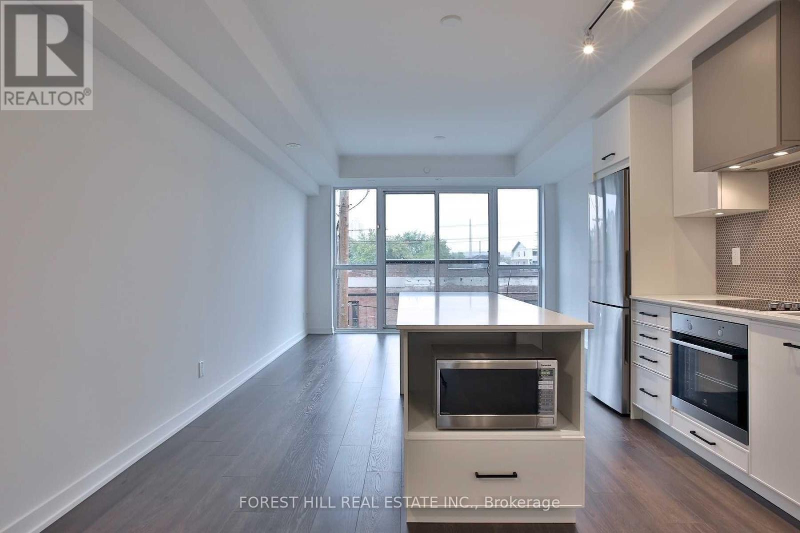 402 - 899 Queen Street E, Toronto, Ontario M4M 1J4 - Photo 2 - E12587696
