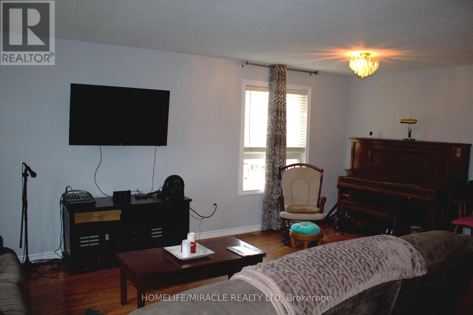 38 Dunsmore Lane, Barrie, Ontario  L4M 7A1 - Photo 12 - S12587800