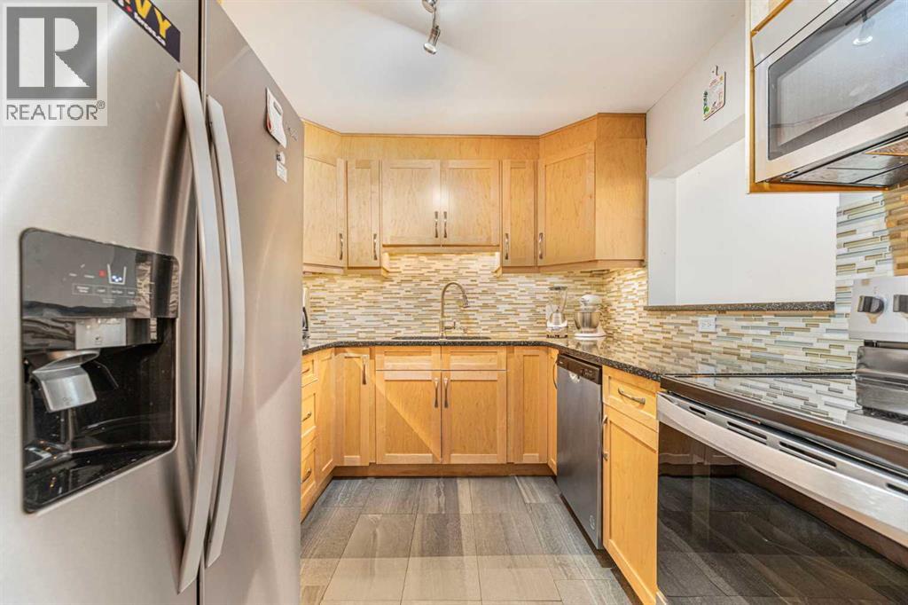 410, 3730 50 Street Nw, Calgary, Alberta  T3A 2V9 - Photo 3 - A2272893