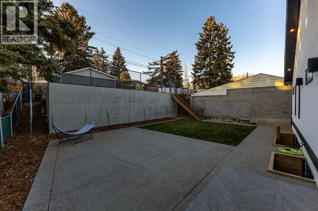 30 Roselawn Crescent Nw, Calgary, Alberta  T2K 1K6 - Photo 49 - A2269817