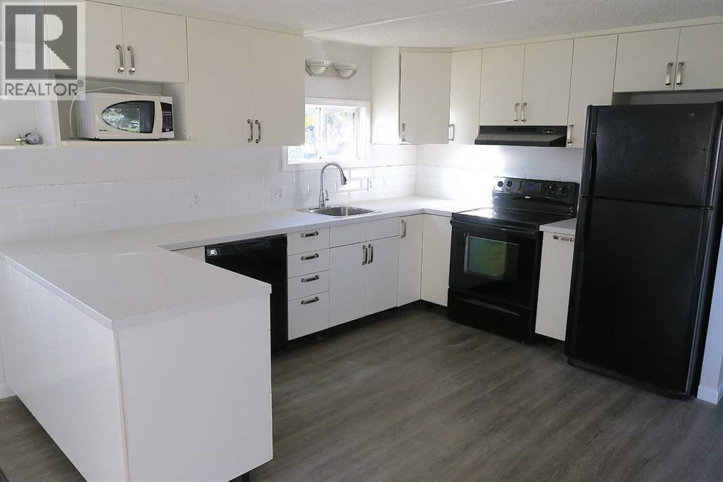 901 Briarwood Crescent, Strathmore, Alberta  T1P 1E7 - Photo 2 - A2266636