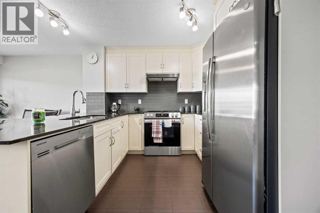 180 Panatella Way Nw, Calgary, Alberta  T3K 0X1 - Photo 5 - A2250983