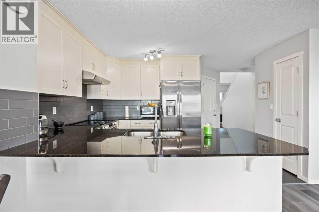 180 Panatella Way Nw, Calgary, Alberta  T3K 0X1 - Photo 7 - A2250983