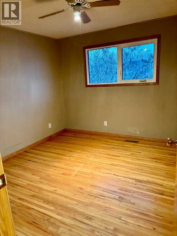 7711 Bowcliffe Crescent Nw, Calgary, Alberta  T3B 2S5 - Photo 15 - A2260325