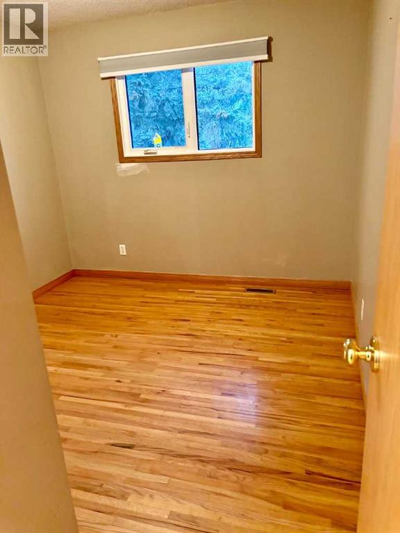 7711 Bowcliffe Crescent Nw, Calgary, Alberta  T3B 2S5 - Photo 14 - A2260325