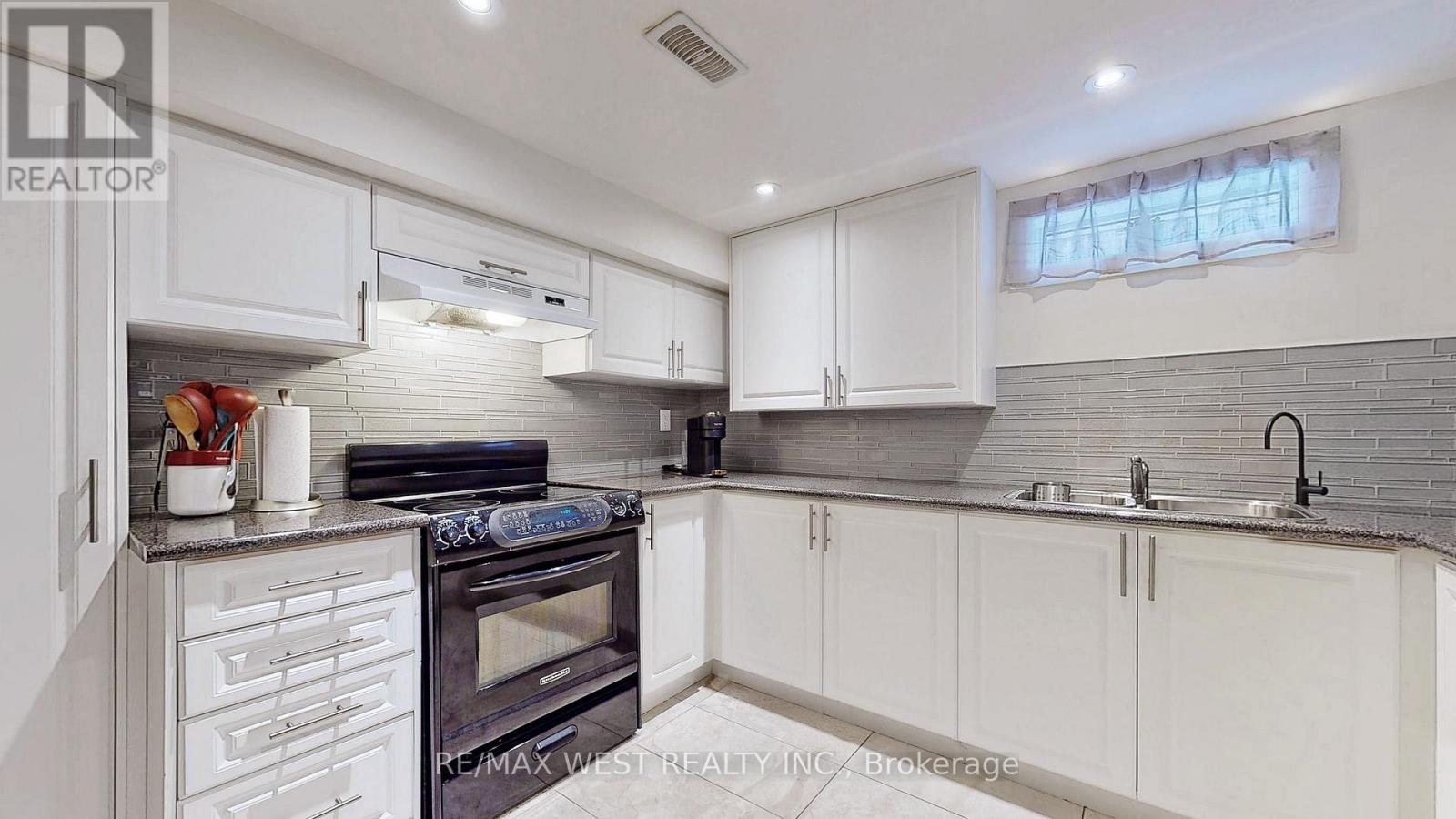 Basement - 139 Ranee Avenue, Toronto, Ontario  M6A 1N3 - Photo 11 - C12588046