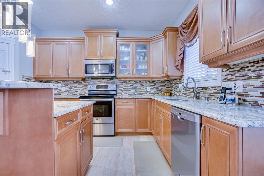 77 Saddleland Drive Ne, Calgary, Alberta  T3J 5J3 - Photo 9 - A2273224