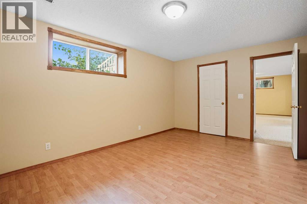 12 Bow Way, Cochrane, Alberta  T4C 1N4 - Photo 36 - A2258102