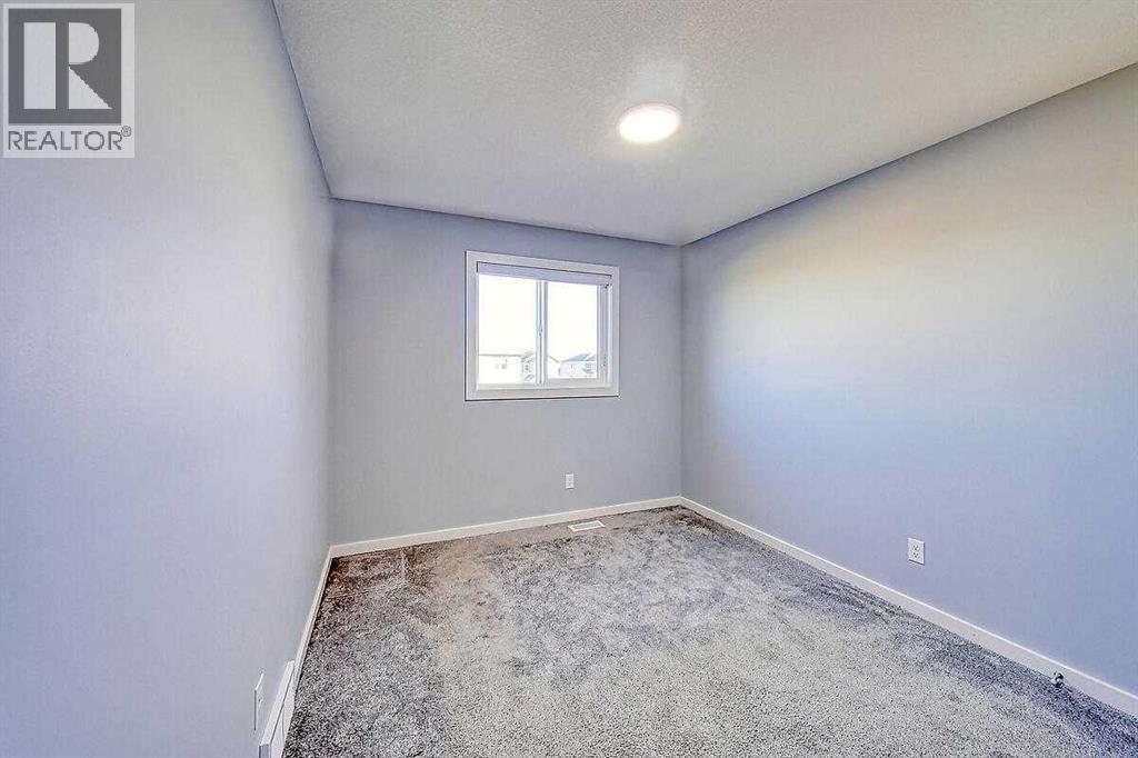 310 Savanna Terrace Ne, Calgary, Alberta  T3J 2J7 - Photo 21 - A2268279