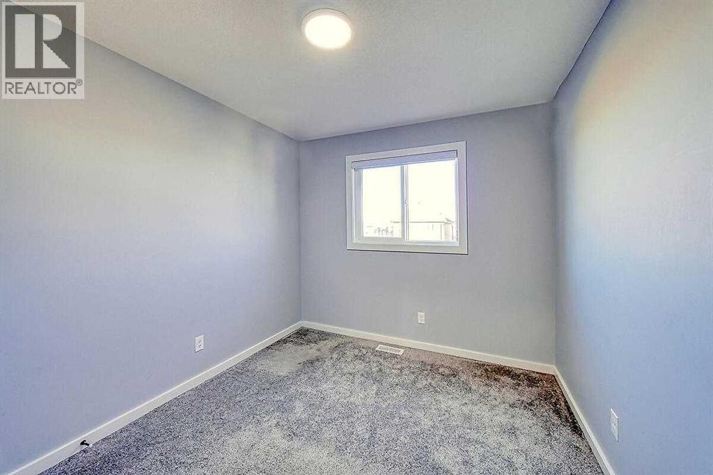 310 Savanna Terrace Ne, Calgary, Alberta  T3J 2J7 - Photo 19 - A2268279