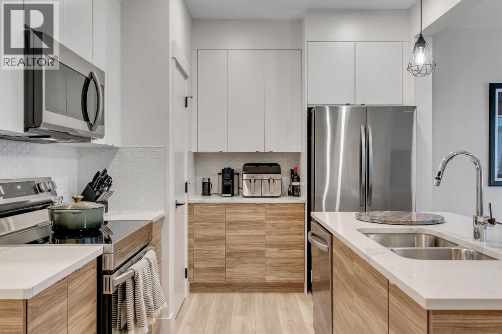 941 Cobblemore Common Sw, Airdrie, Alberta  T4B 5M1 - Photo 6 - A2267472