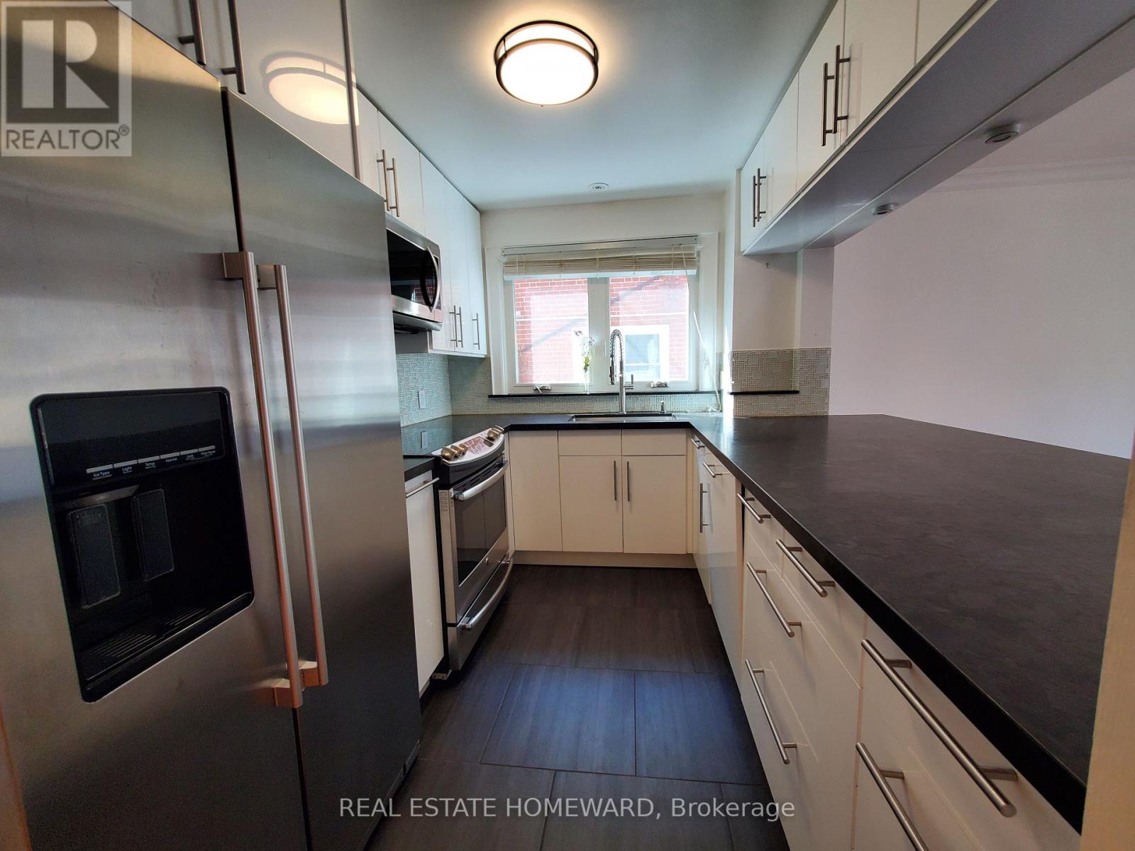 Main Floor - 21 Love Crescent, Toronto, Ontario M4E 1V6 - Photo 4 - E12588148