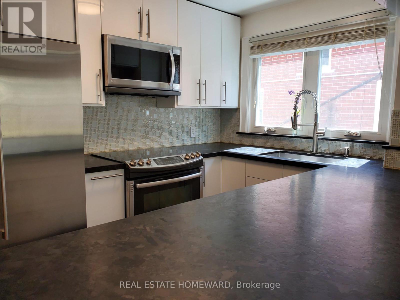 Main Floor - 21 Love Crescent, Toronto, Ontario M4E 1V6 - Photo 6 - E12588148