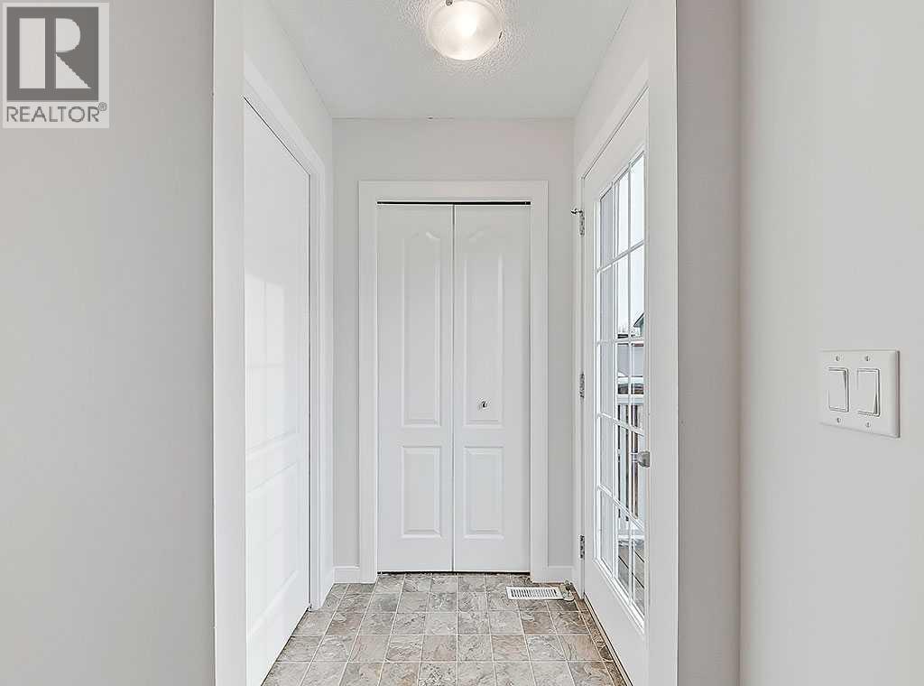 409 Cimarron Boulevard, Okotoks, Alberta  T1S 0A9 - Photo 12 - A2269381